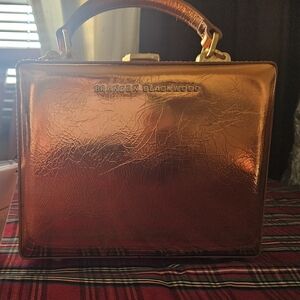 Brandon Blackwood Kendrick Trunk Metallic Orange Cracked Leather